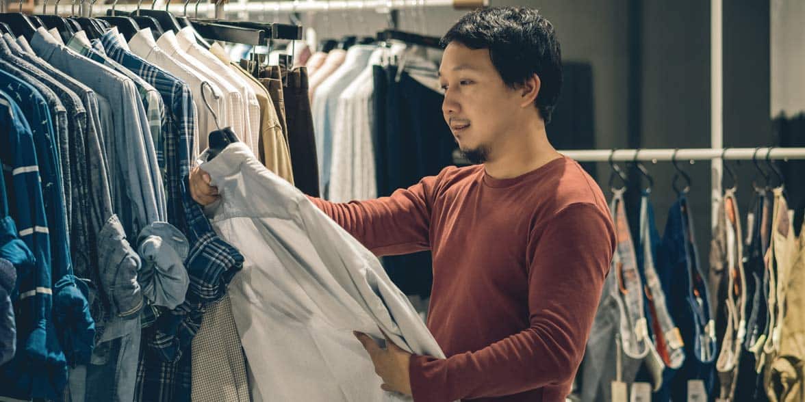 Photo of a man shopping for clothes